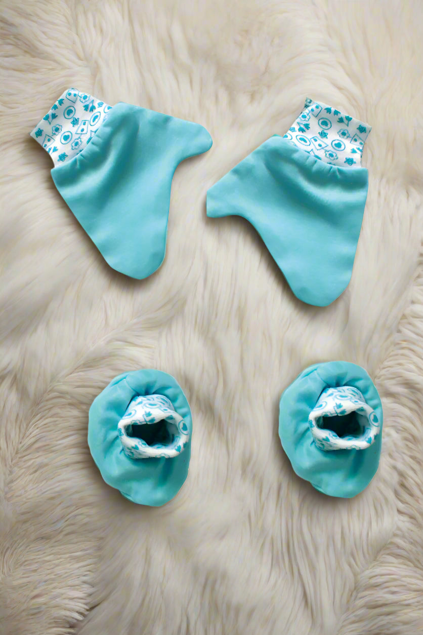 Soft cotton newborn baby mittens and booties set in Blue color for 0–6 months with printed elastic bands