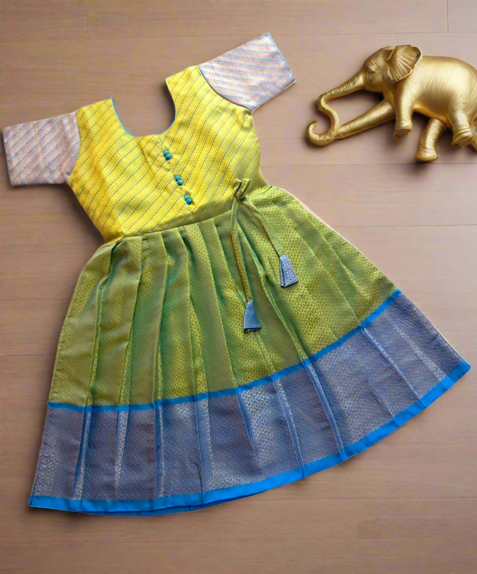 Green and blue muslin frock for girls with elbow-length sleeves and gold detailing – traditional festive kids wear from Lotus Ethnic