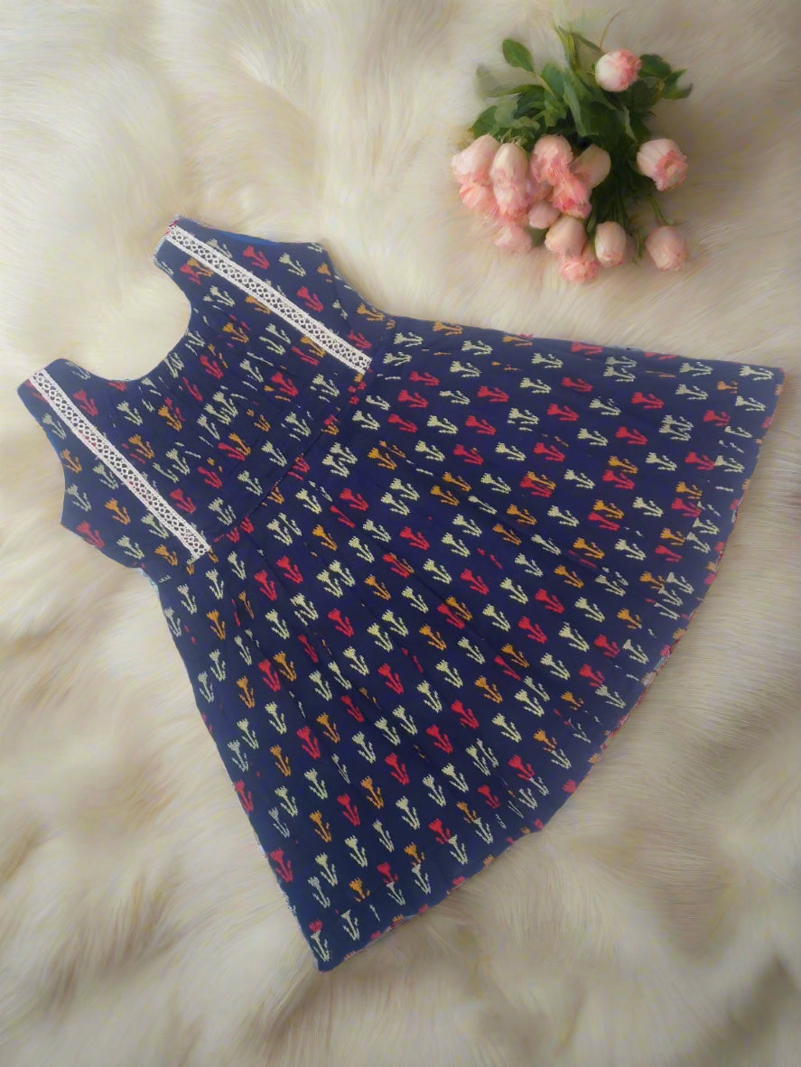 Navy blue ikat print cotton frock for girls with lace front panel