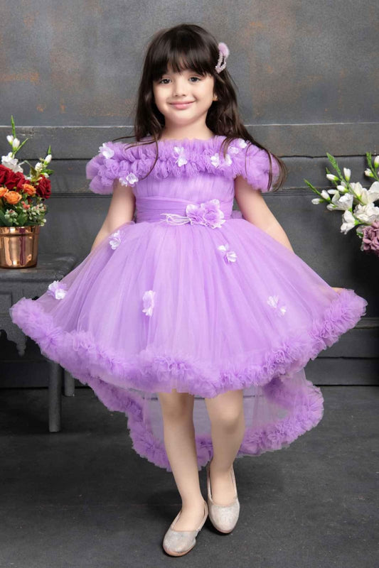 Lavender high-low party frock for girls with floral appliqué and ruffle detailing – perfect for birthday and wedding occasions.