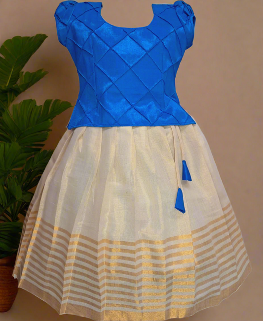 Girls Kerala Kasavu tissue pattu pavadai with handcrafted pintuck royal blue top – ethnic kids wear for festivals and weddings.