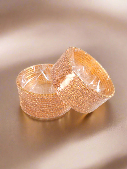 Set of 12 women’s gold rhinestone bangles – premium stone-studded Bangle set for weddings, festivals, and ethnic wear.
