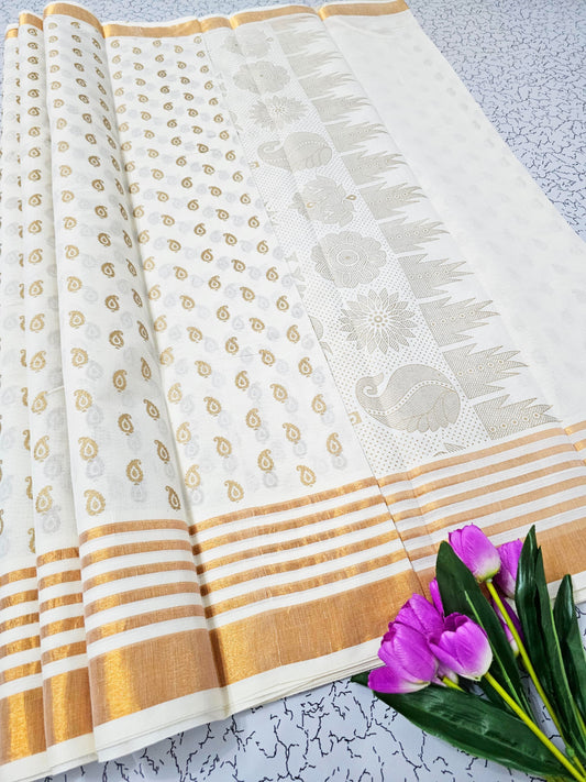 White and gold cotton saree with paisley motifs and striped pallu – traditional South Indian festive wear
