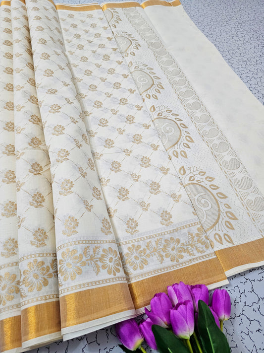 White and gold cotton saree with paisley motifs and striped pallu – traditional South Indian festive wear