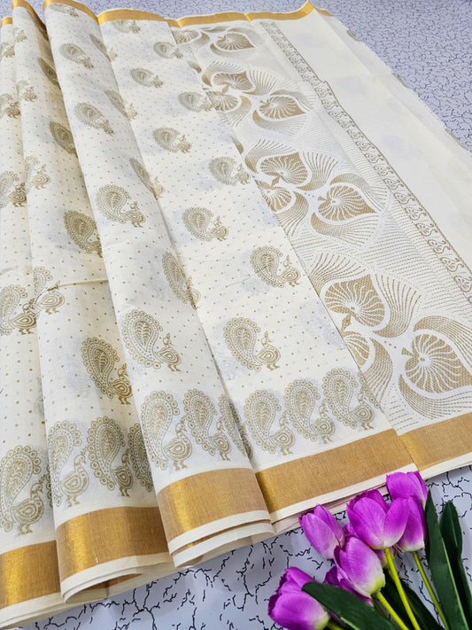White and gold cotton saree with paisley motifs and striped pallu – traditional South Indian festive wear