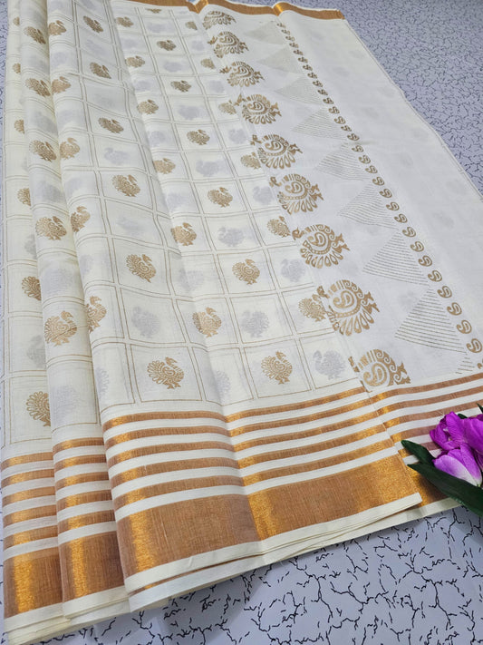 White and gold cotton saree with paisley motifs and striped pallu – traditional South Indian festive wear