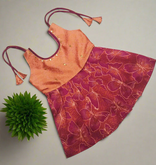 Peach and Wine Banarasi Designer Baby Frock with Embossed Butterfly Pattern