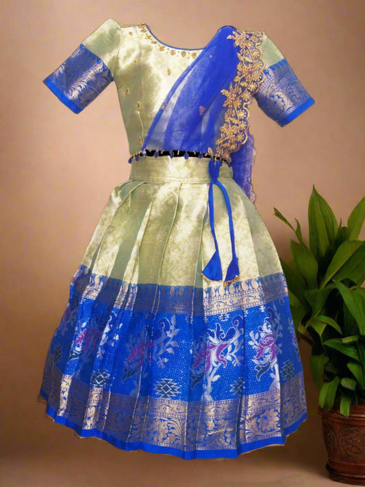 “Front view of Cream Ikkat Chanderi Banarasi Lehenga Choli with Aari Work and Blue Half Saree”