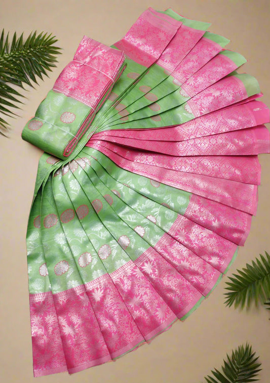 Banarasi semi silk saree with silver zari floral cutwork in parrot green and pink – traditional Indian wedding wear with contrast border