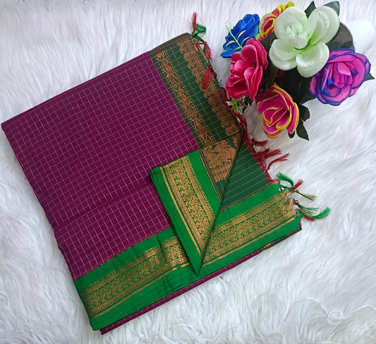 Traditional Purple Kalyani cotton saree with Green zari border and checked pattern – lightweight daily wear handloom saree