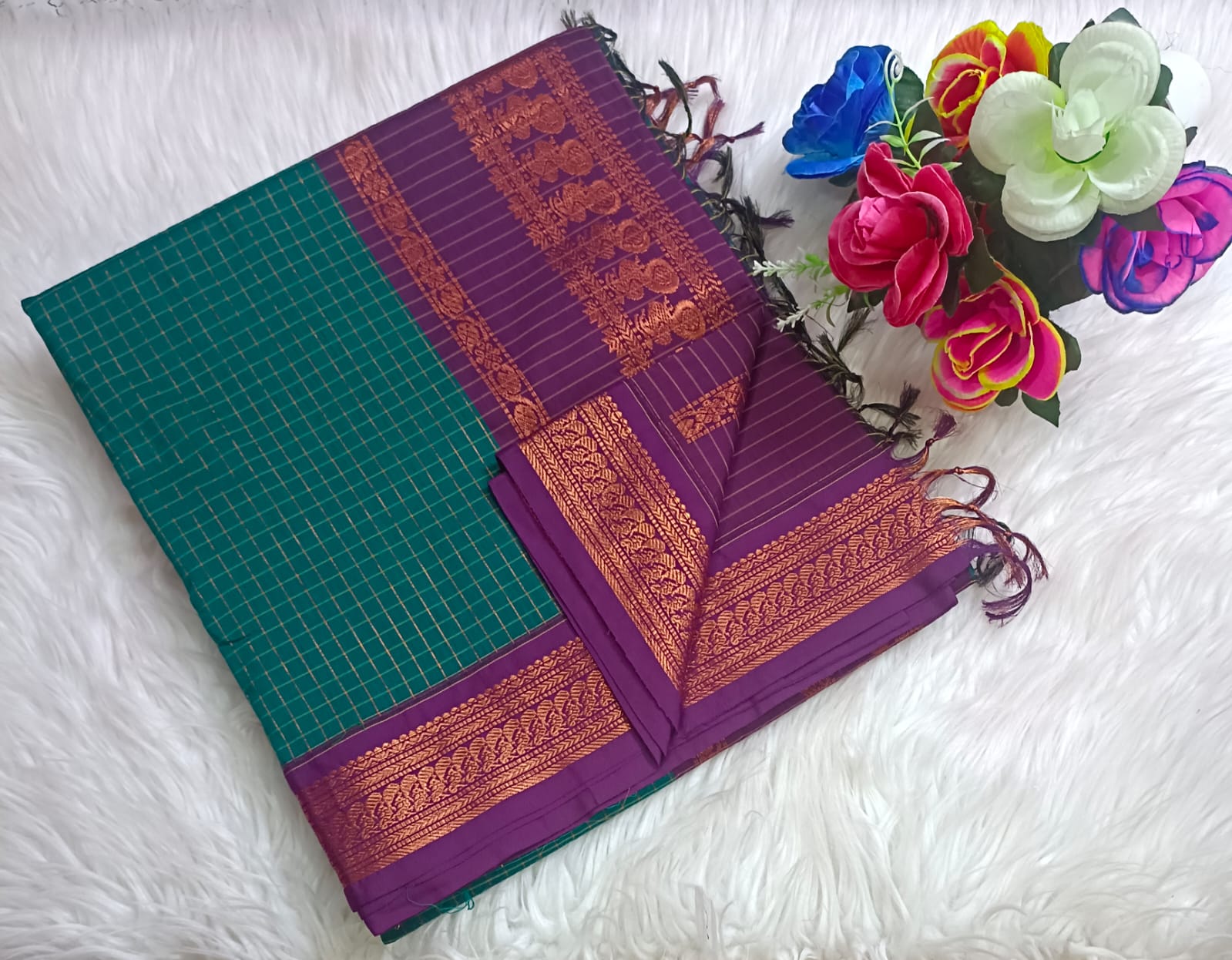 Traditional Teal green Kalyani cotton saree with Purple zari border and checked pattern – lightweight daily wear handloom saree"