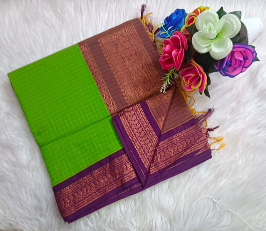 Traditional Parrot green Kalyani cotton saree with Purple zari border and checked pattern – lightweight daily wear handloom saree