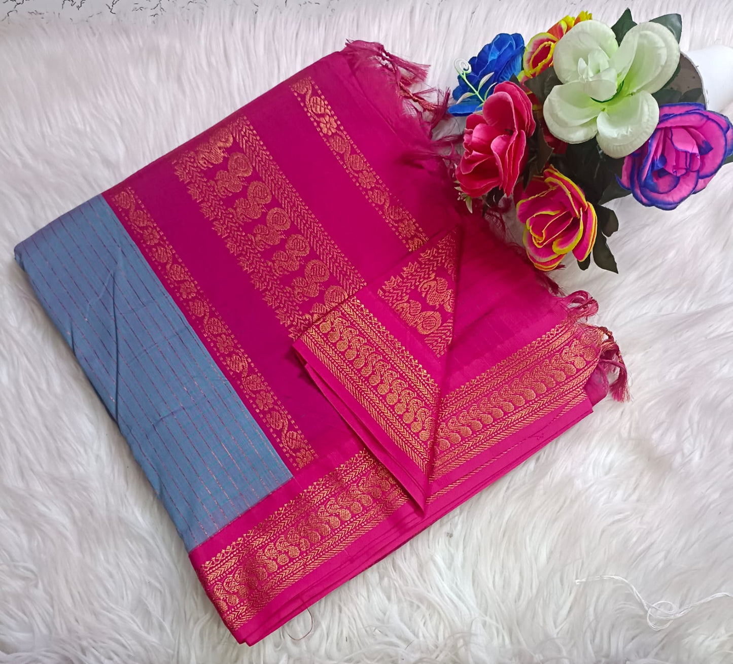 Traditional Skyblue Kalyani cotton saree with Rani pink zari border and checked pattern – lightweight daily wear handloom saree