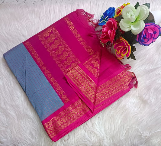 Traditional Skyblue Kalyani cotton saree with Rani pink zari border and checked pattern – lightweight daily wear handloom saree
