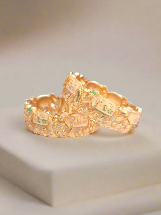 Women’s 2-piece gold finish premium bangle set – traditional kada bangles with enamel detailing for weddings and parties.