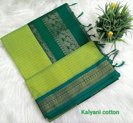 Traditional green Kalyani cotton saree with zari border and checked pattern – lightweight daily wear handloom saree